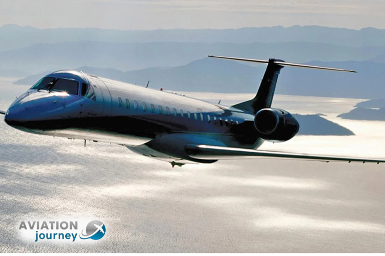Embraer ERJ145 regional jet flying over mountains